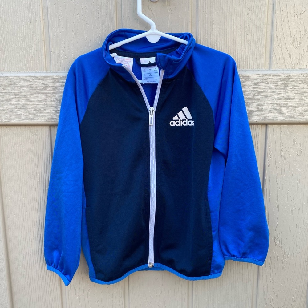 Adidas Light a weight Blue Jacket.